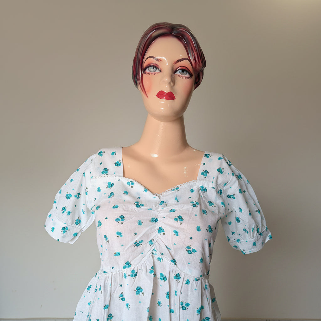 PRINTED PEPLUM TOP