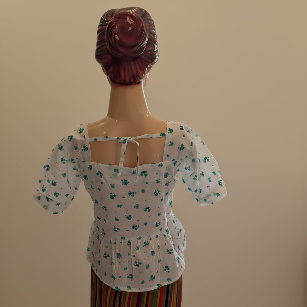 PRINTED PEPLUM TOP