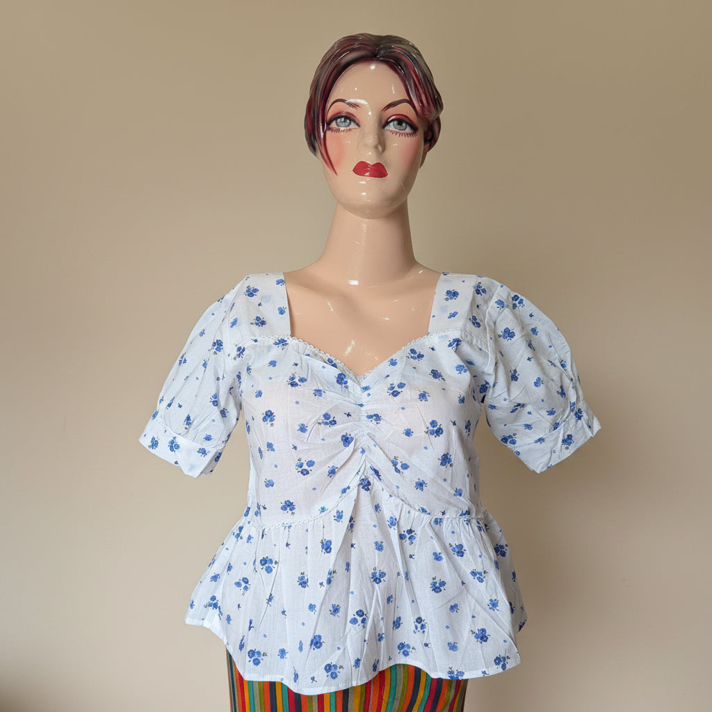 PRINTED PEPLUM TOP