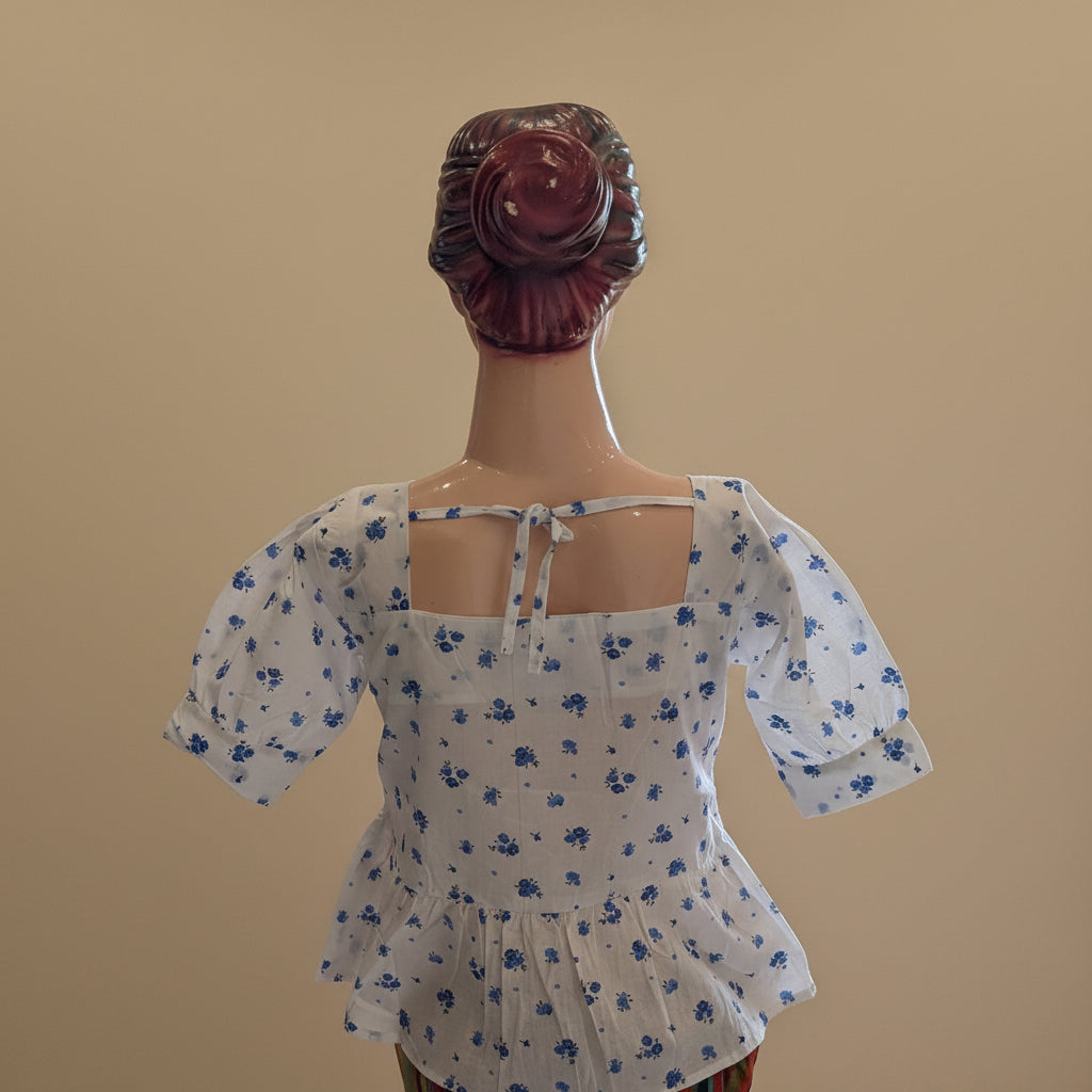 PRINTED PEPLUM TOP